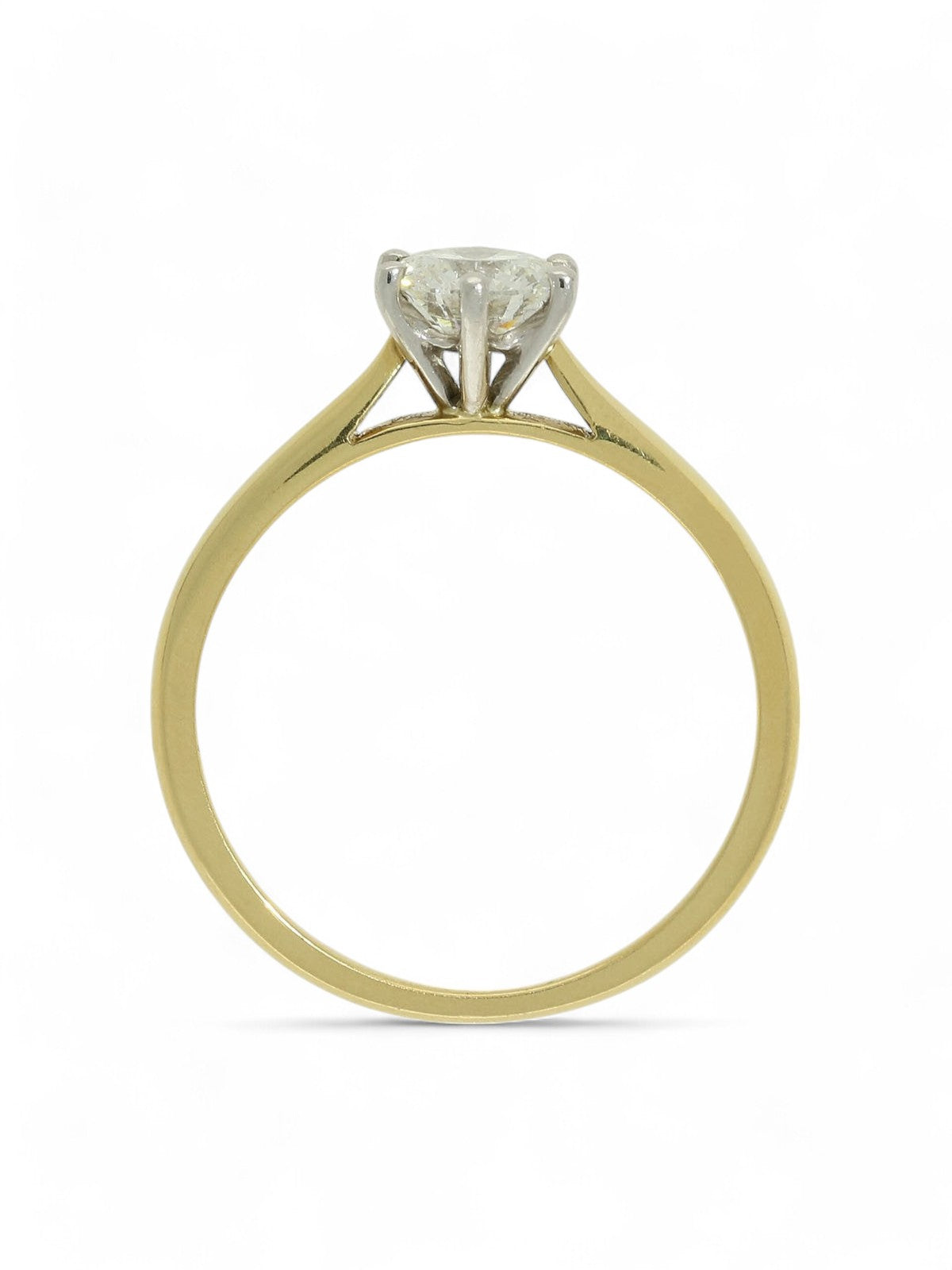 Lab grown diamond ring in a six-claw setting with a yellow gold band on a white background.