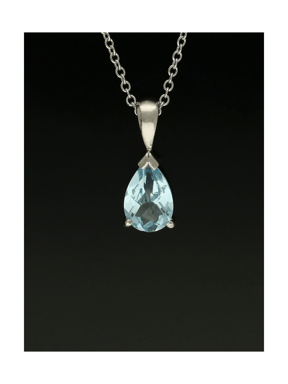 Blue Topaz Faceted Pear Cut Pendant Necklace in 9ct White Gold