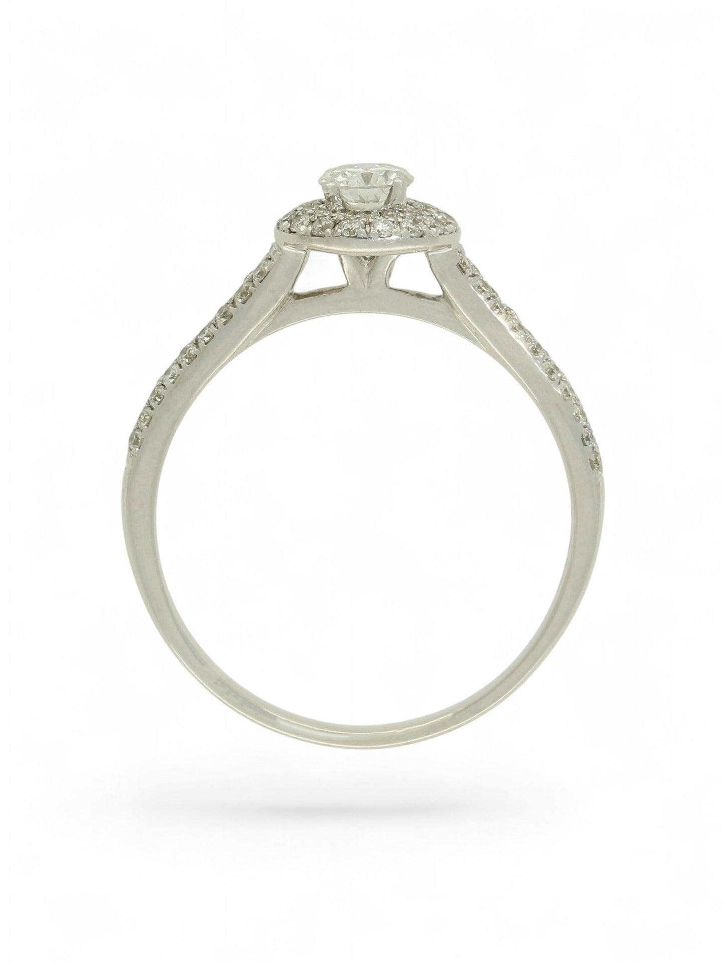 Pre-Owned 9ct white gold diamond halo ring with a 0.25ct centre stone, diamond halo, and diamond set shoulders.