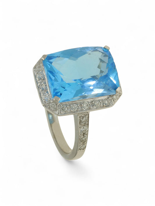 Pre Owned Blue Topaz & Diamond Halo Dress Ring in 18ct White Gold