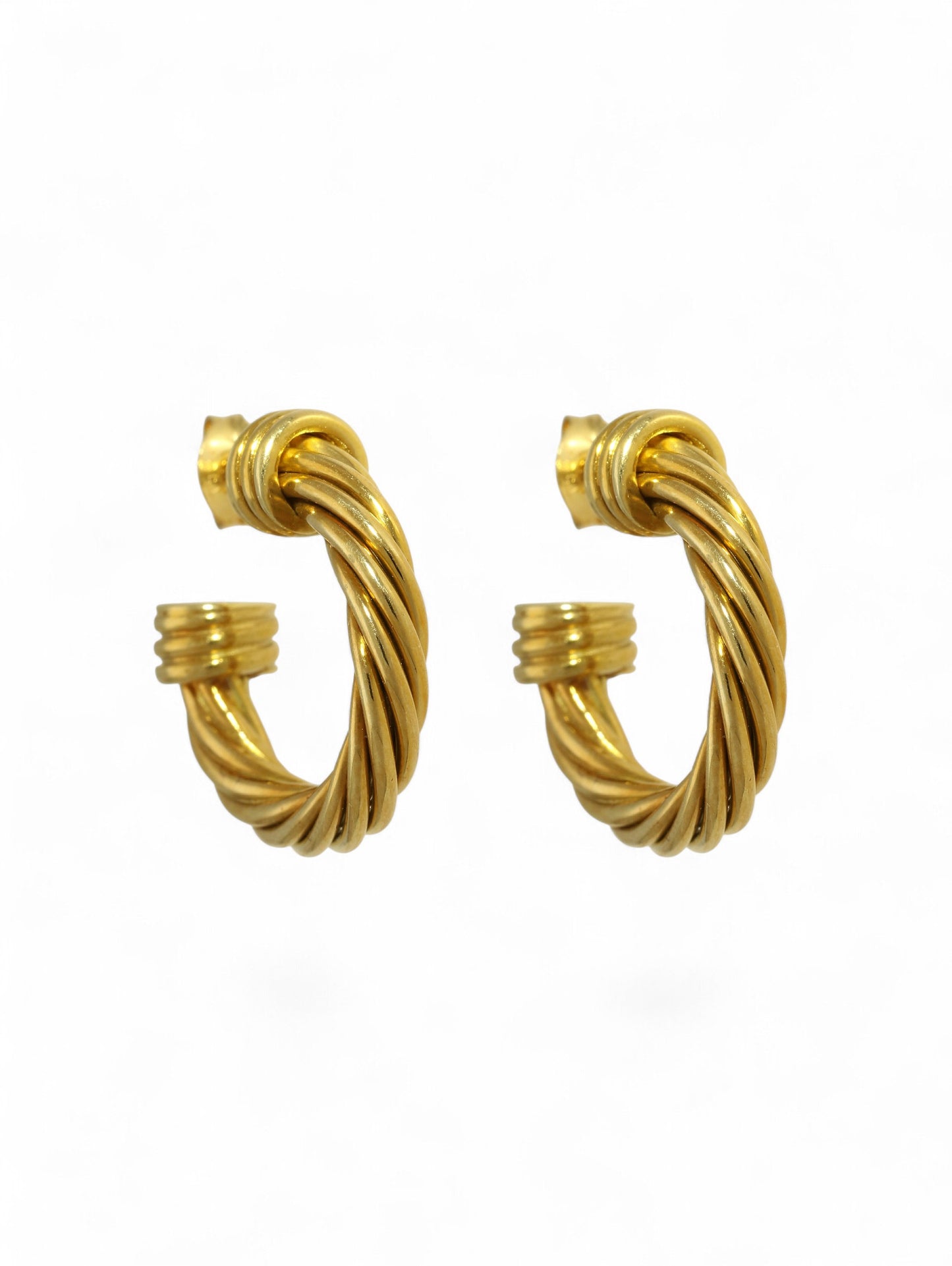 Yellow-gold twist hoop earrings with post and butterfly fitting on a white background.