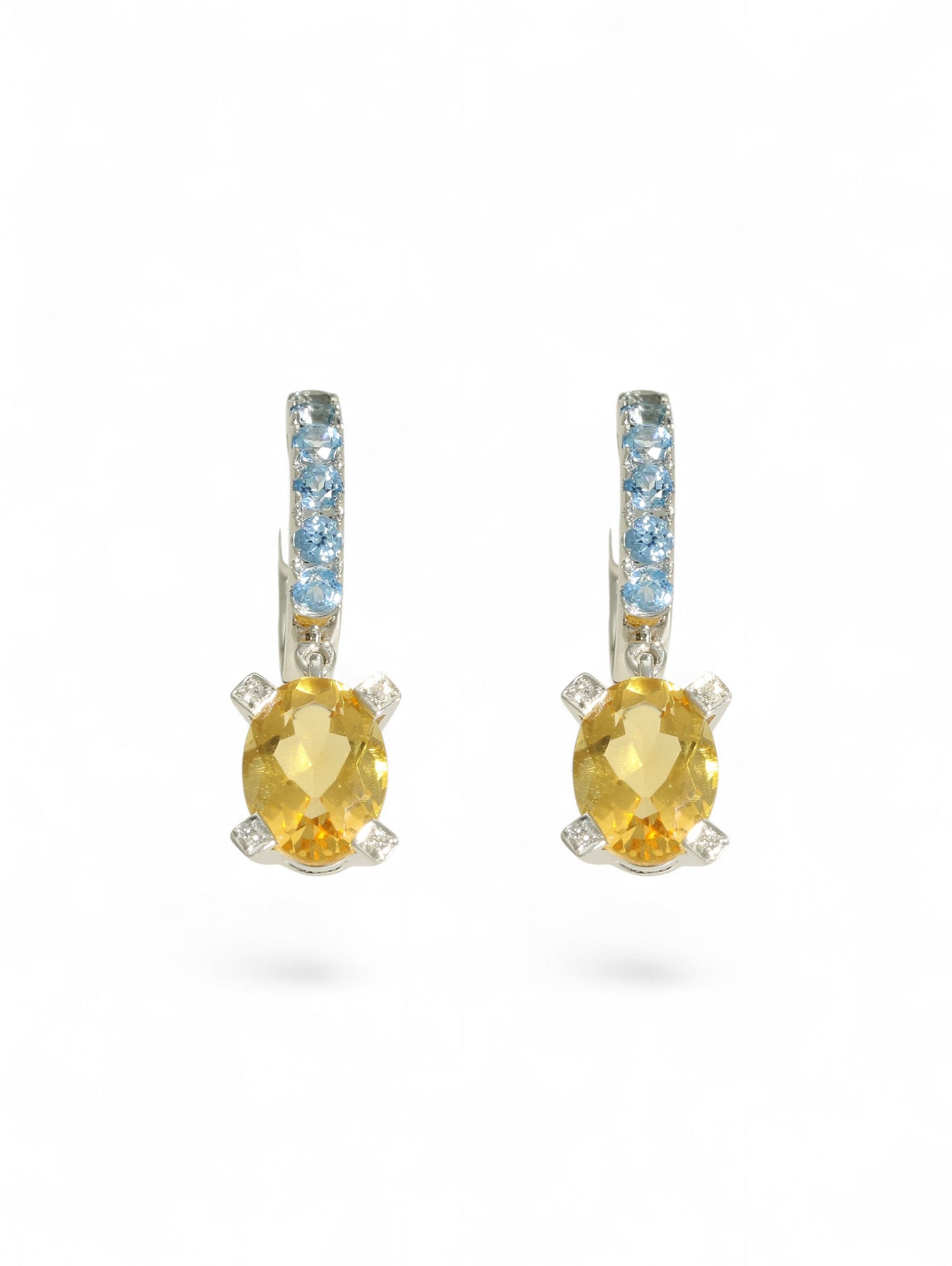 Citrine, aquamarine and diamond drop earrings on a white background.