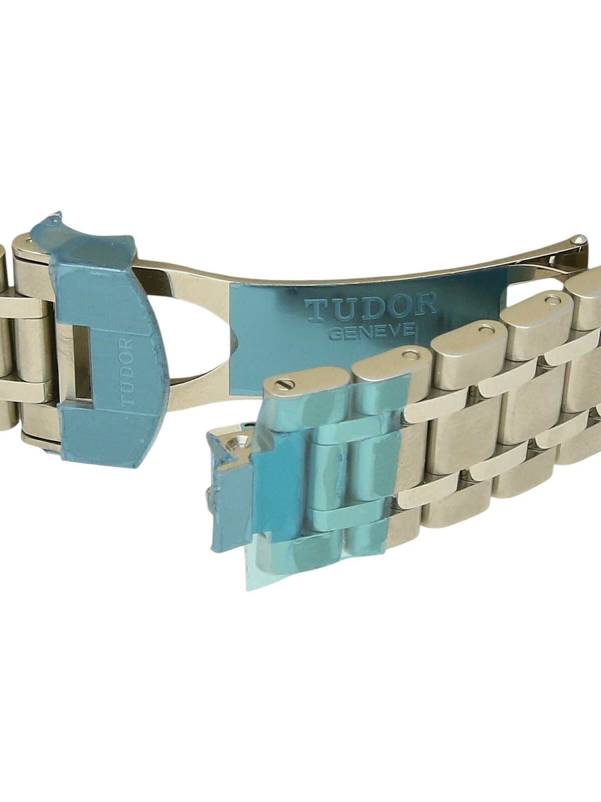 Tudor Royal steel bracelet with clasp wrapped in blue protective film on a white background.