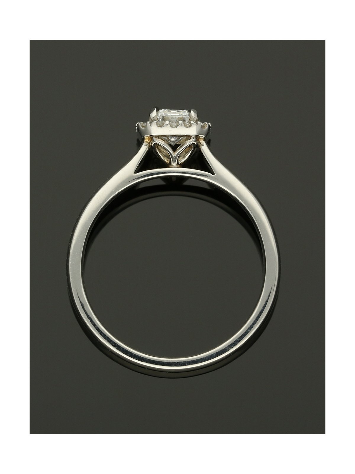 Diamond Halo Engagement Ring 0.70ct Certificated Emerald Cut in Platinum