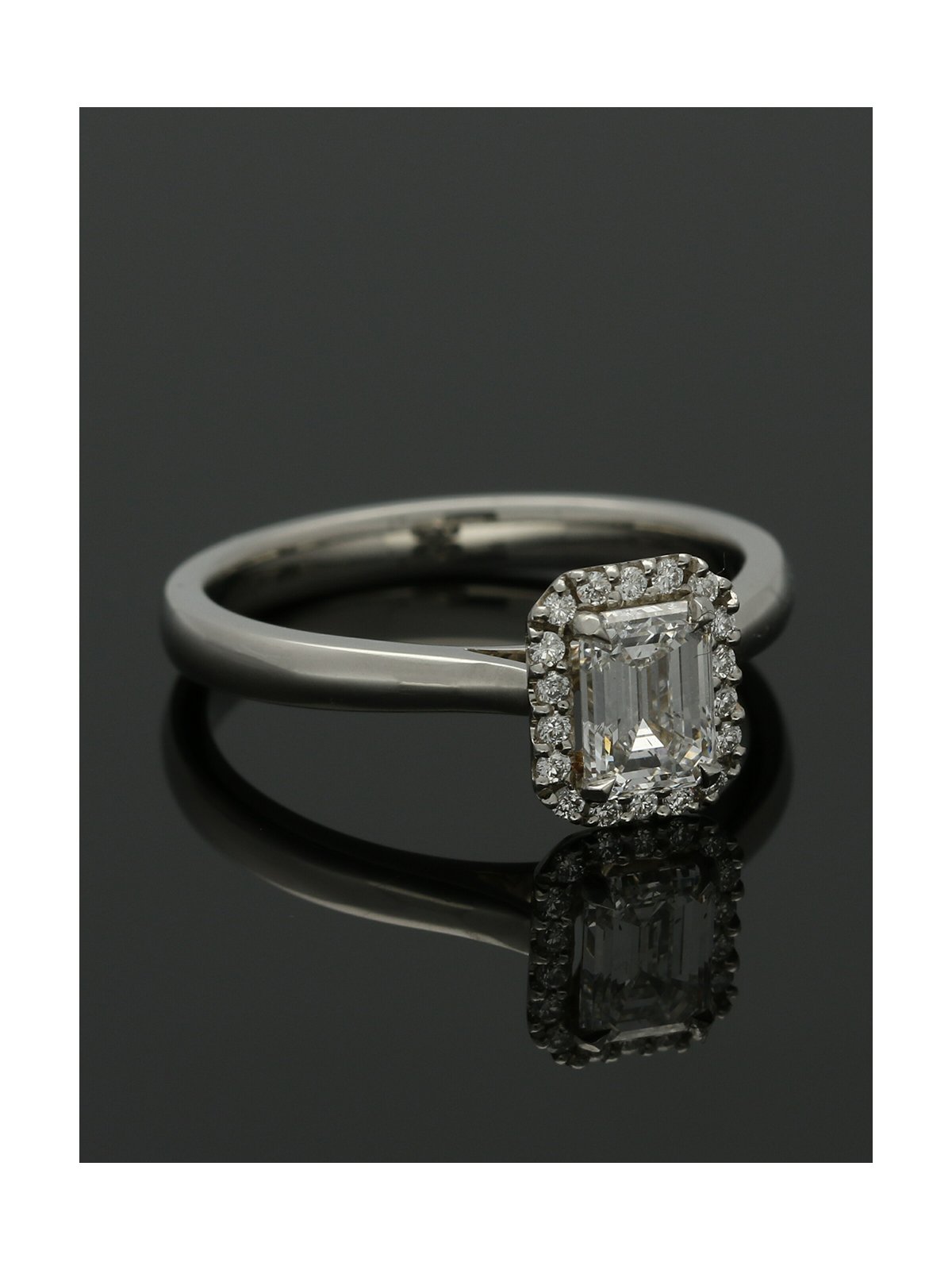Diamond Halo Engagement Ring 0.70ct Certificated Emerald Cut in Platinum