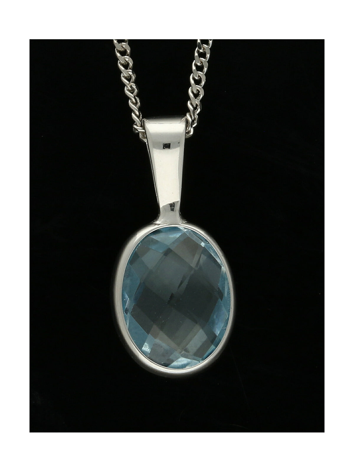 Blue Topaz Oval Pendant Necklace in 9ct White Gold