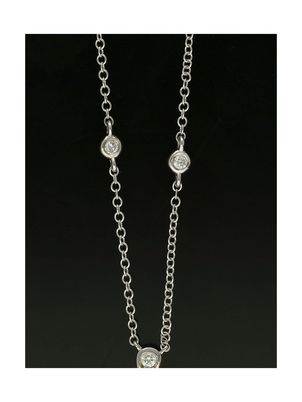 Blue Topaz & Diamond Pear Drop Pendant in 9ct White Gold on 18" Chain