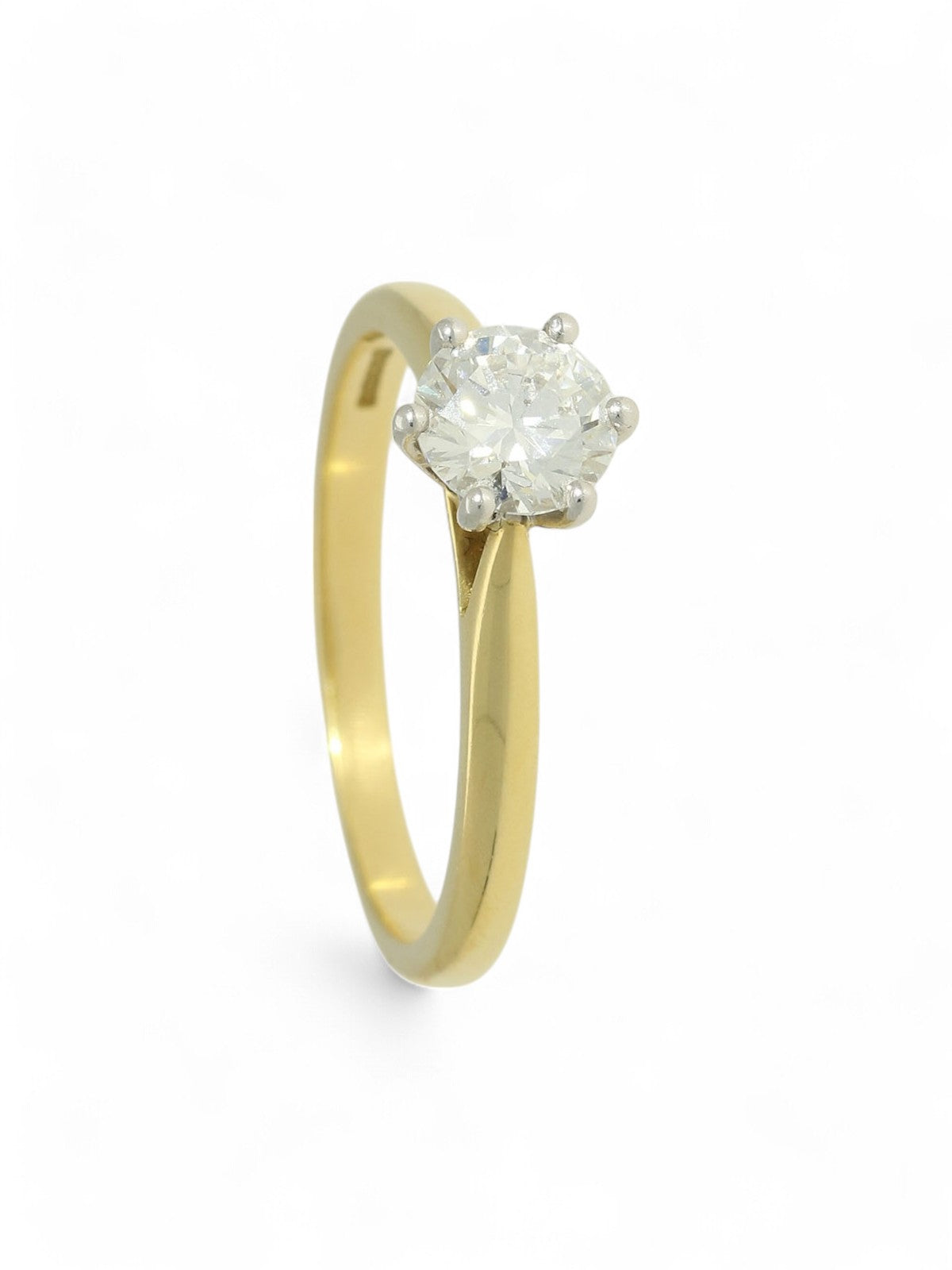 Lab grown diamond ring in a six-claw setting with a yellow gold band on a white background.