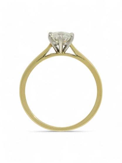 Lab grown diamond ring in a six-claw setting with a yellow gold band on a white background.