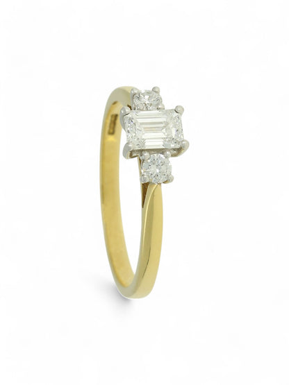 0.46ct Emerald Cut & 0.14ct Round Brilliant Cut Diamond Three Stone Ring in 18ct Yellow & White Gold