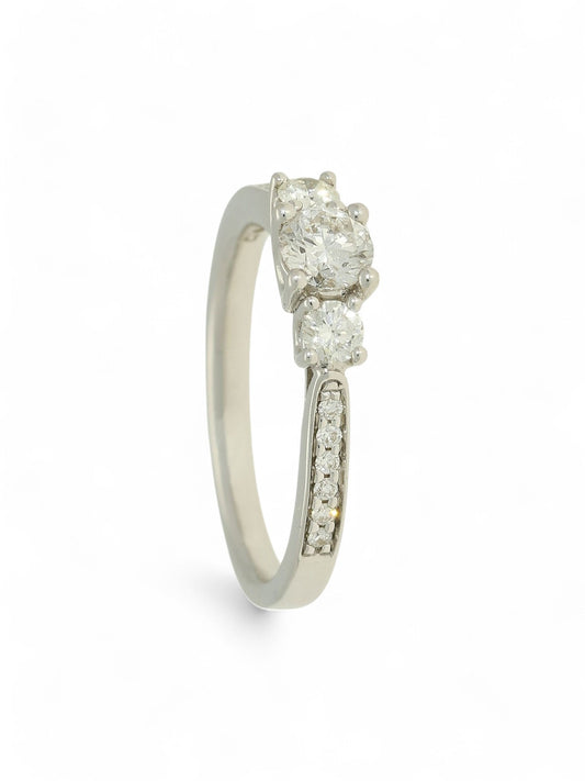 Three Stone Diamond Ring 0.62ct Round Brilliant Cut in 18ct White Gold with Diamond Shoulders