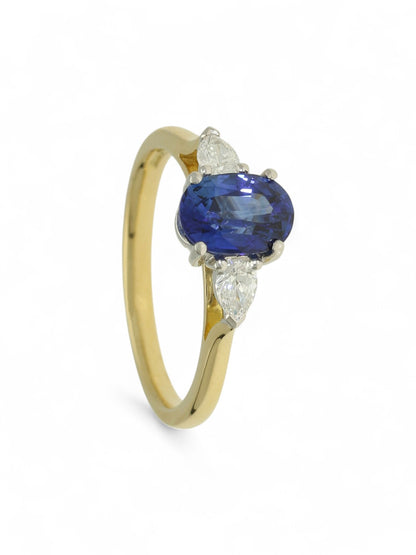 1.36ct Oval Cut Sapphire & 0.26ct Pear Cut Diamond Three Stone Ring in 18ct Yellow & White Gold
