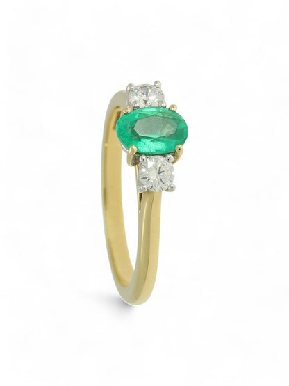 0.58ct Oval Cut Emerald & 0.28ct Round Brilliant Cut Diamond Three Stone Ring in 18ct Yellow & White Gold