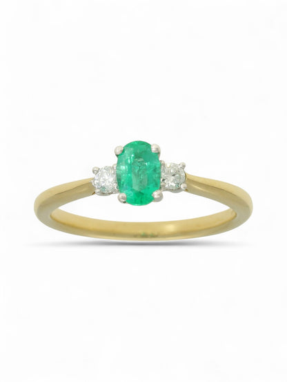 0.45ct Oval Cut Emerald & 0.13ct Round Brilliant Cut Diamond Three Stone Ring in 18ct Yellow & White Gold