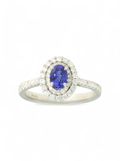 0.62ct Oval Cut Sapphire & 0.40ct Round Brilliant Cut Diamond Cluster Ring in 18ct White Gold with Diamond Shoulders