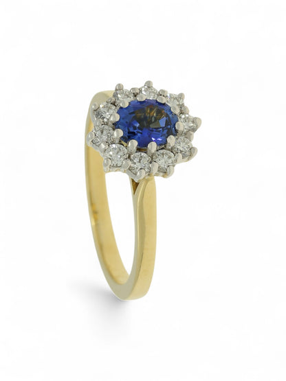 0.79ct Oval Cut Sapphire & 0.43ct Round Brilliant Cut Diamond Cluster Ring in 18ct Yellow and White Gold