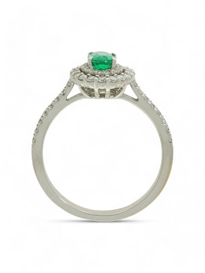 0.45ct Oval Cut Emerald & 0.40ct Round Brilliant Cut Diamond Cluster Ring in 18ct White Gold with Diamond Shoulders