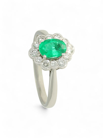 0.73ct Oval Cut Emerald & 0.40ct Round Brilliant Cut Diamond Cluster Ring Oval Cut in 18ct White Gold