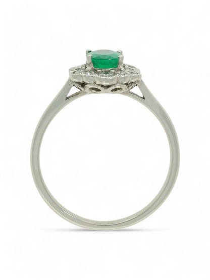 0.73ct Oval Cut Emerald & 0.40ct Round Brilliant Cut Diamond Cluster Ring Oval Cut in 18ct White Gold