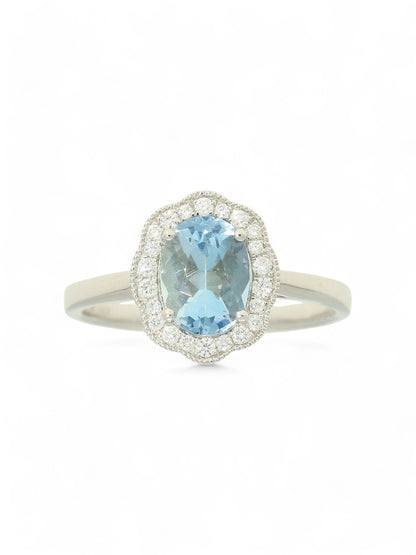 1.27ct Oval Cut Aquamarine & 0.15ct Round Brilliant Cut Diamond Cluster Ring in 18ct White Gold