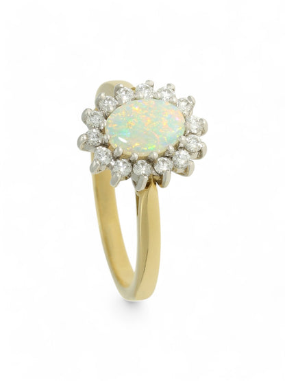 0.42ct Oval Cut Opal & 0.25ct Round Brilliant Cut Diamond Cluster Ring in 18ct Yellow & White Gold