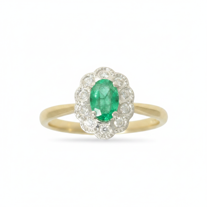 Emerald & Diamond Cluster Ring with 7x5mm Emerald and 0.10ct of Round Brilliant Diamonds in 9ct Yellow & White Gold