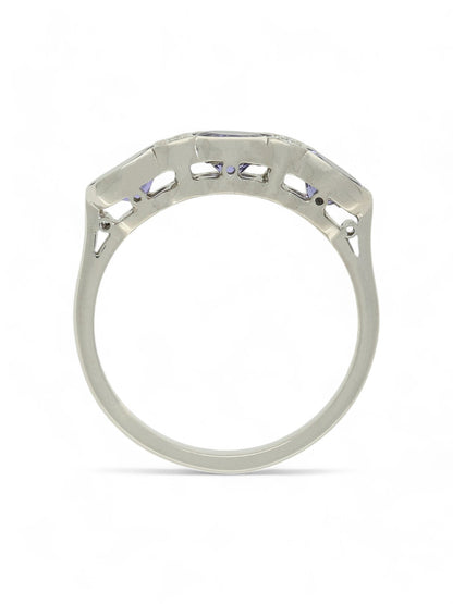 1.01ct Oval Cut Tanzanite & 0.09ct Round Brilliant Cut Diamond Seven Stone Ring in 18ct White Gold