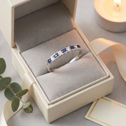 Sapphire & Diamond Half Eternity Ring with 0.12ct of Round Brilliant Diamonds in 9ct White Gold