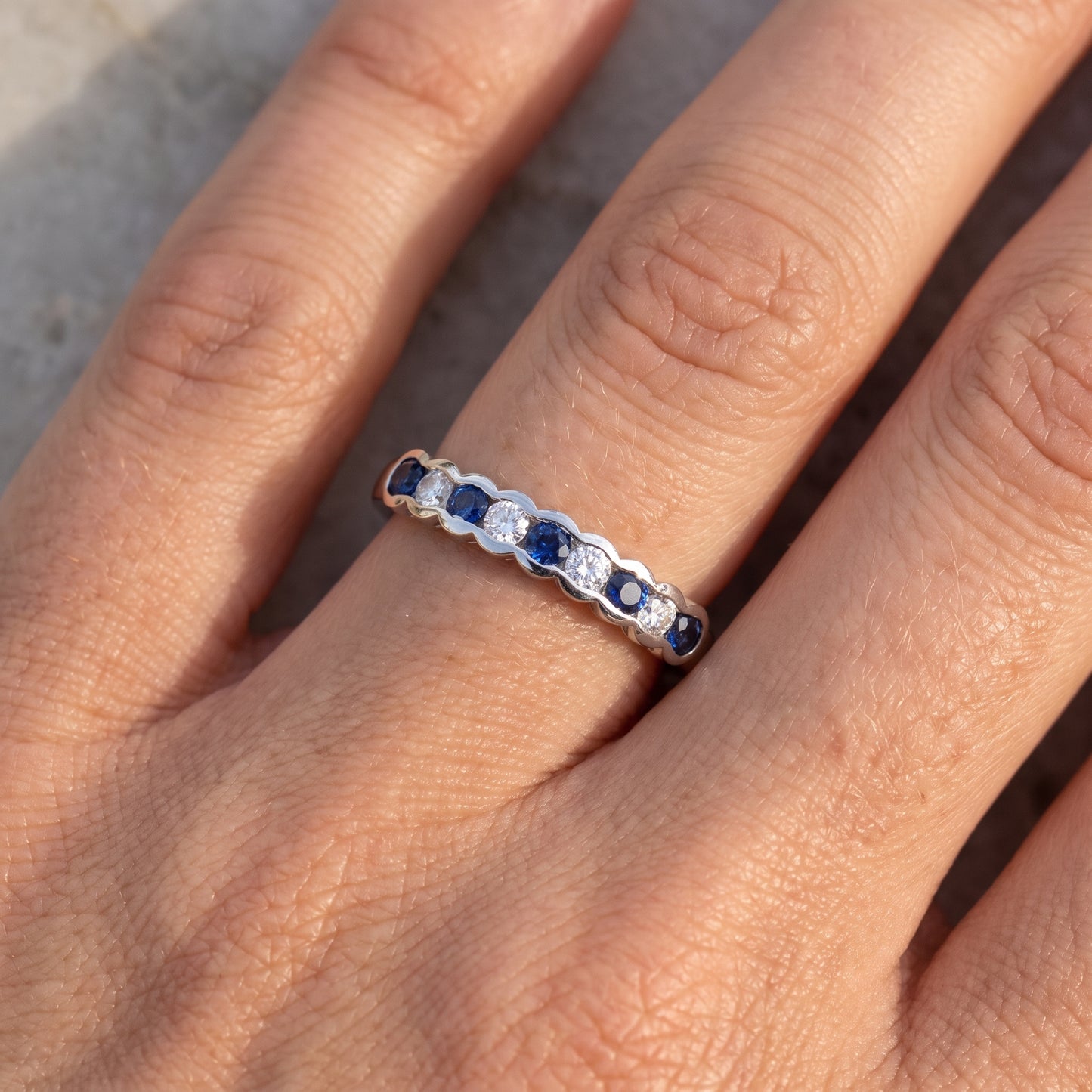 Sapphire & Diamond Half Eternity Ring with 0.12ct of Round Brilliant Diamonds in 9ct White Gold