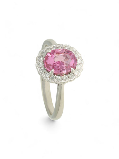 1.76ct Oval Cut Pink Sapphire & 0.19ct Round Brilliant Cut Diamond Cluster Ring in Platinum