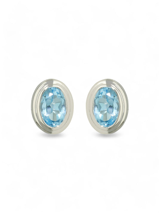 Blue Topaz Oval Cut Single Stone Earrings in 9ct White Gold