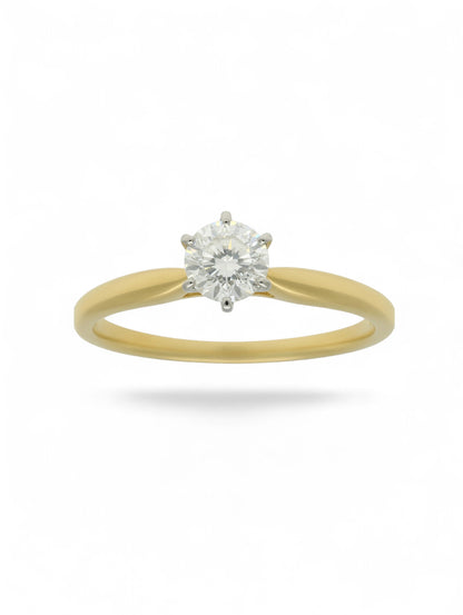 Pre-Owned diamond solitaire ring with an 18ct yellow gold shank, 6 18ct white gold claws, and a 0.33ct round brilliant cut diamond centre stone.