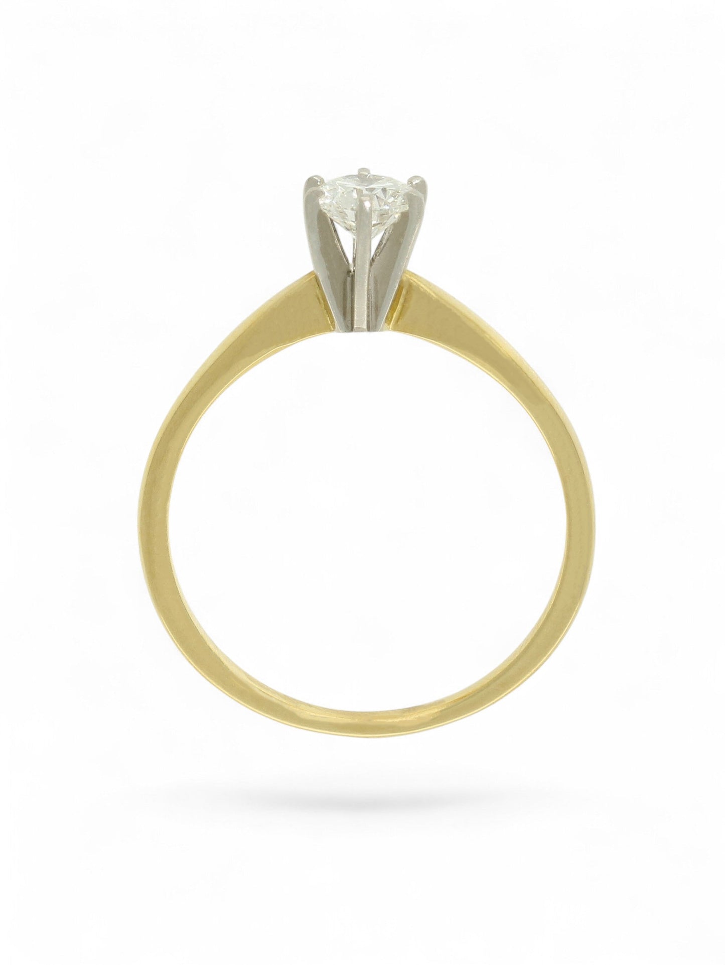 Pre-Owned diamond solitaire ring with an 18ct yellow gold shank, 6 18ct white gold claws, and a 0.33ct round brilliant cut diamond centre stone.