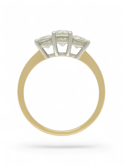 Pre-Owned ring with three round brilliant cut diamonds set in white gold and mounted on a stamped 18ct yellow gold shank.