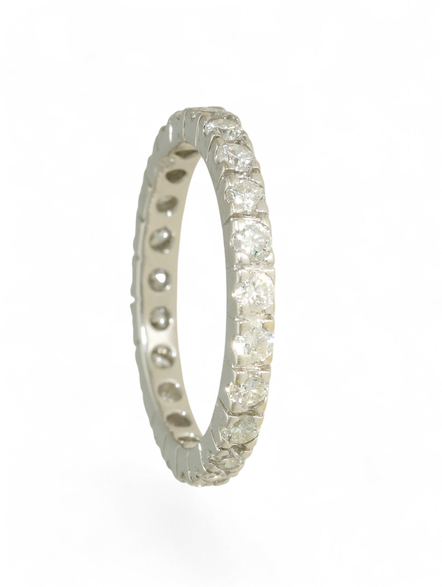 18ct white gold diamond-set full eternity ring on a white background.