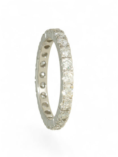 18ct white gold diamond-set full eternity ring on a white background.