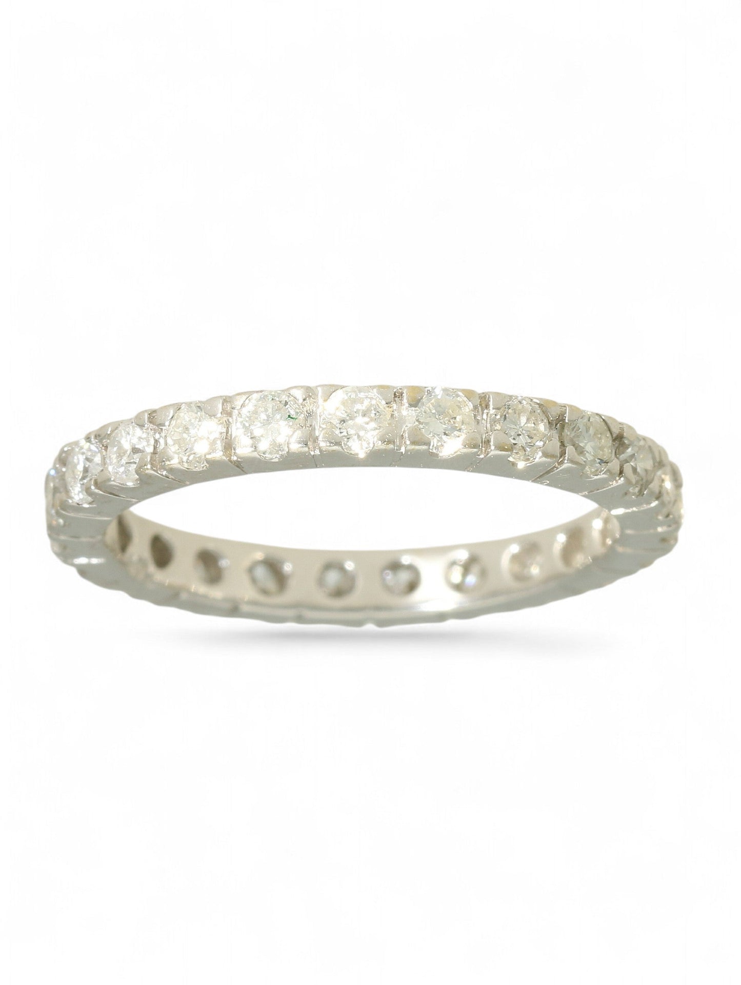 18ct white gold diamond-set full eternity ring on a white background.