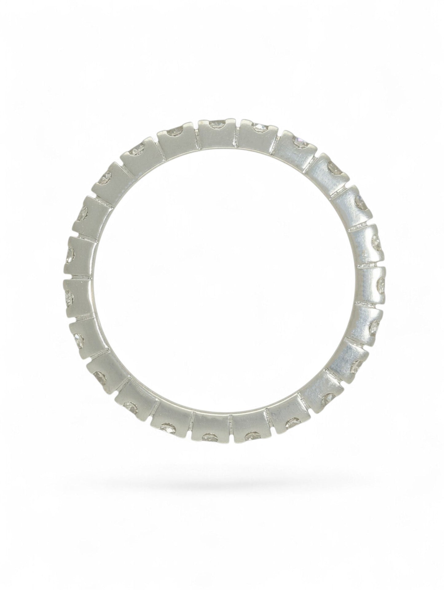 18ct white gold diamond-set full eternity ring on a white background.