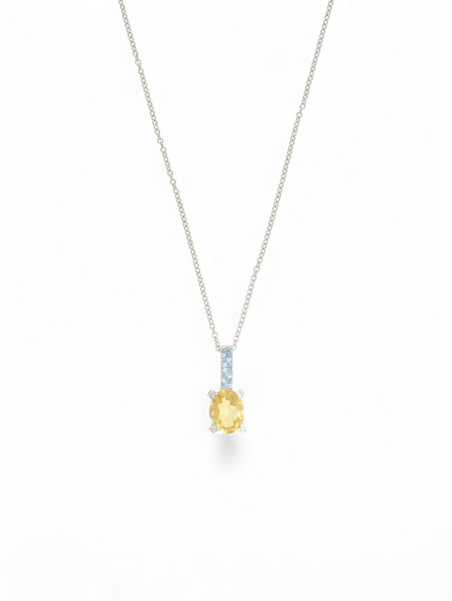 Citrine, aquamarine and diamond pendant with a white-gold chain on a white background.