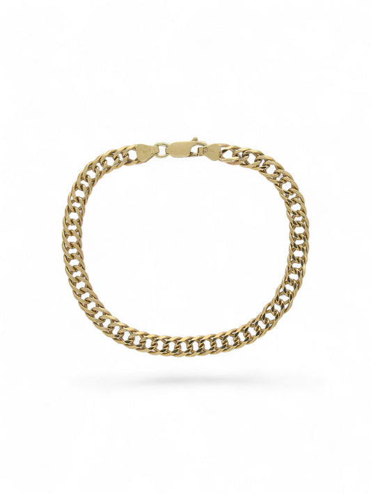 Yellow-gold double link curb bracelet with trigger clasp on a white background.