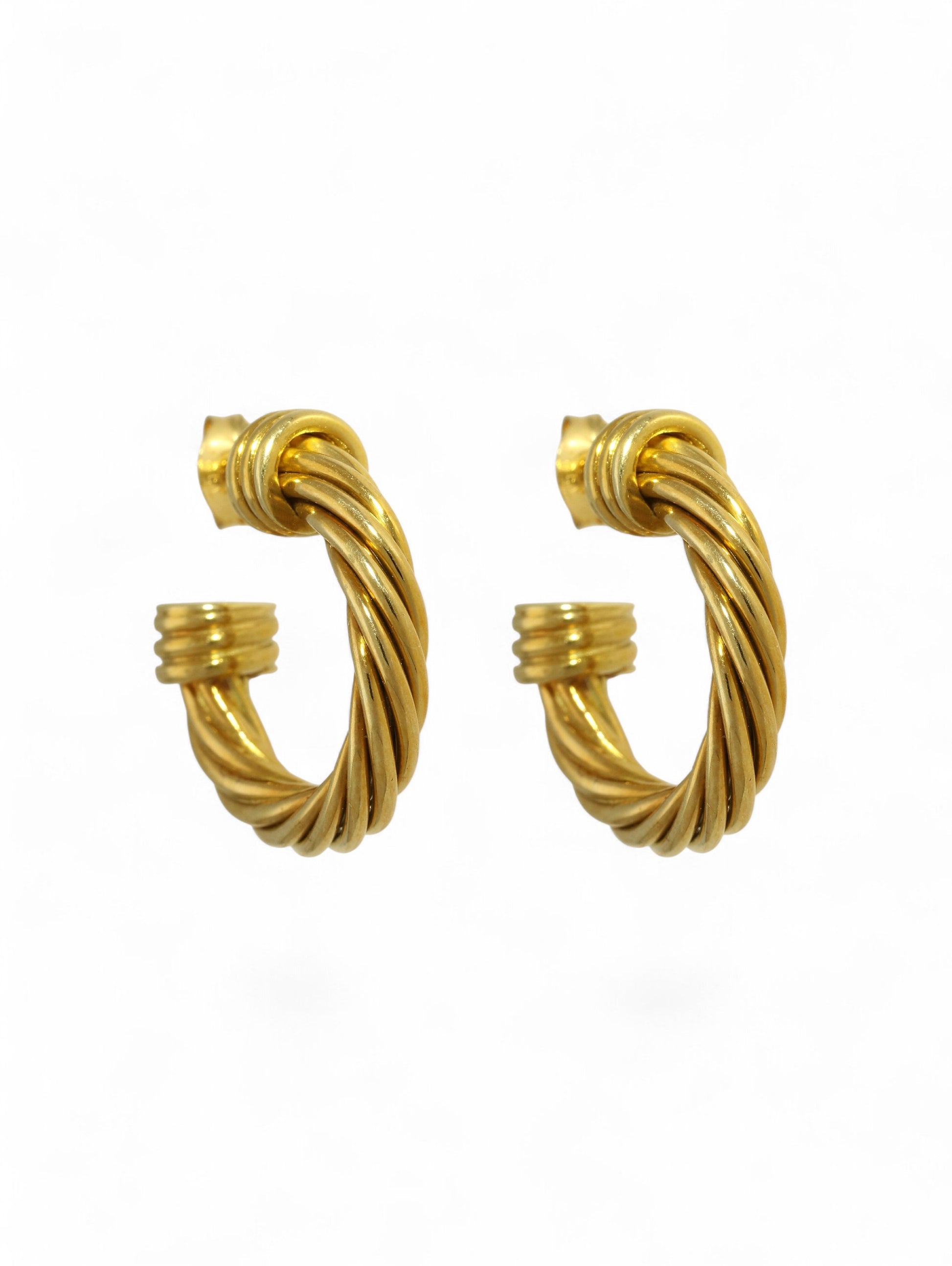 Yellow-gold twist hoop earrings with post and butterfly fitting on a white background.