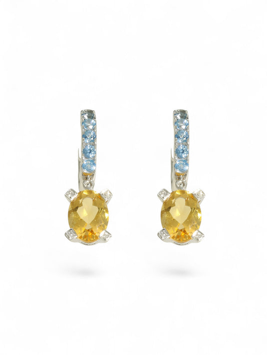 Citrine, aquamarine and diamond drop earrings on a white background.