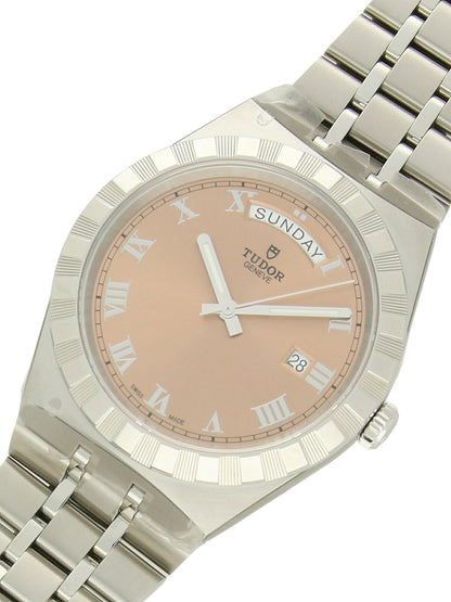 Tudor Royal watch with a steel bracelet and pink dial on a white background.