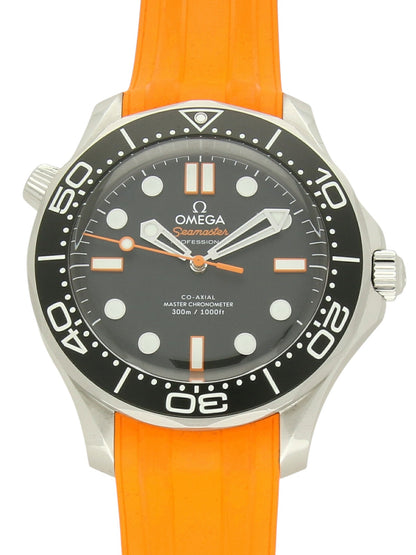 Omega Seamaster with orange rubber strap, black dial, and black bezel on a white background.