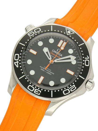 Omega Seamaster with orange rubber strap, black dial, and black bezel on a white background.