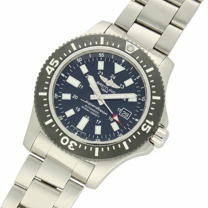 Breitling Superocean with 44mm steel case, steel bracelet and black dial on a white background.