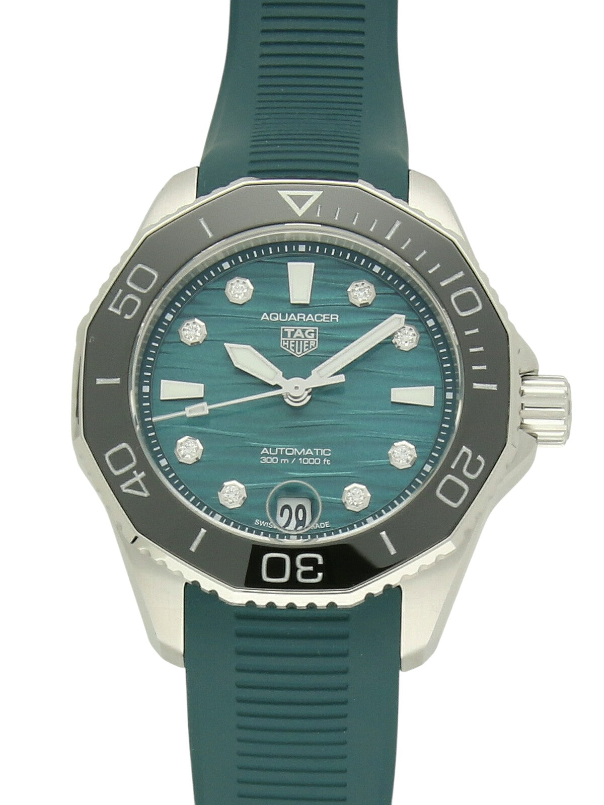 TAG Heuer Aquaracer watch with a green rubber strap and green dial on a white background.