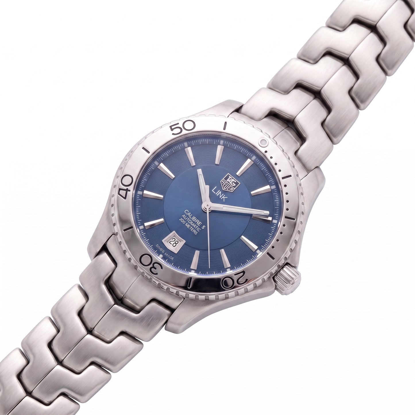 TAG Heuer Link with 42mm steel case, steel bracelet and blue dial on a white background.