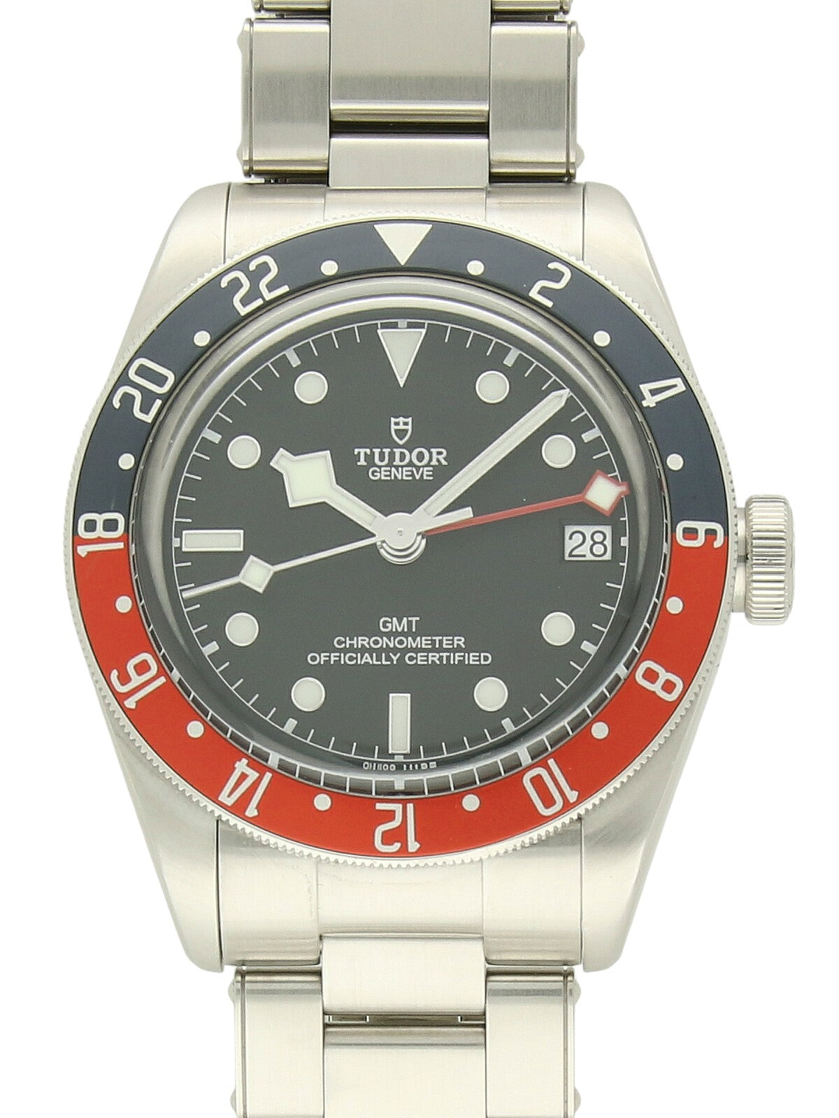 TUDOR Black Bay GMT watch with steel bracelet and red and blue bezel on a white background.