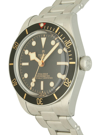 TUDOR Black Bay 58 with steel case, steel bracelet and black dial on a white background.